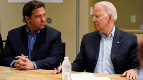 President Joe Biden, right, looks at Florida Gov. Ron DeSantis, left, during a briefing with first responders and local officials in Miami, Thursday, July 1, 2021, on the condo tower that collapsed in Surfside, Fla., last week.