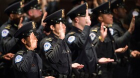 UNITED STATES - JANUARY 23: The 35 officers of Recruit Officer Class #178 take the oath during the U.S. Capitol Police graduation ceremony in the Capitol Visitor Center auditorium on Friday, Jan. 23, 2014. (Photo By Bill Clark/CQ Roll Call)