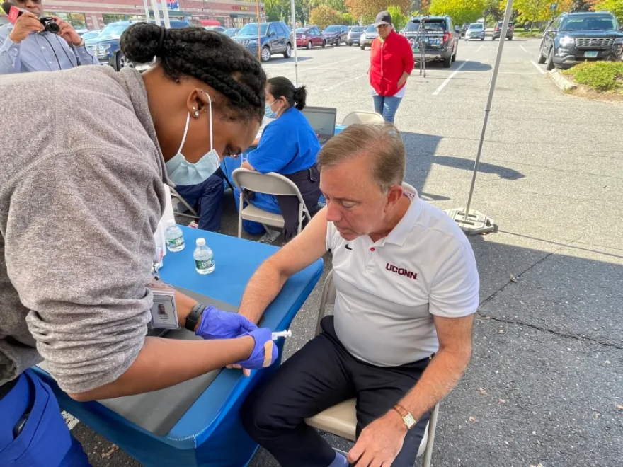 Gov. Ned Lamont got his bivalent COVID booster on Oct. 7, and he urges parents and their children to follow suit when eligible.