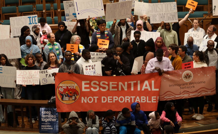 Local officials, clergy, immigration advocates and neighbors call for the release of Fatou Traore at First United Methodist Church in Iowa City on Wednesday.