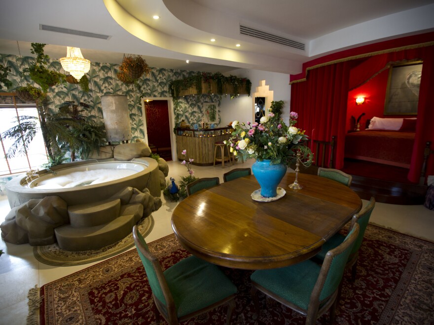 The presidential suite of The Walled Off Hotel is seen in a guesthouse that's now packed with the elusive artist Banksy's work.