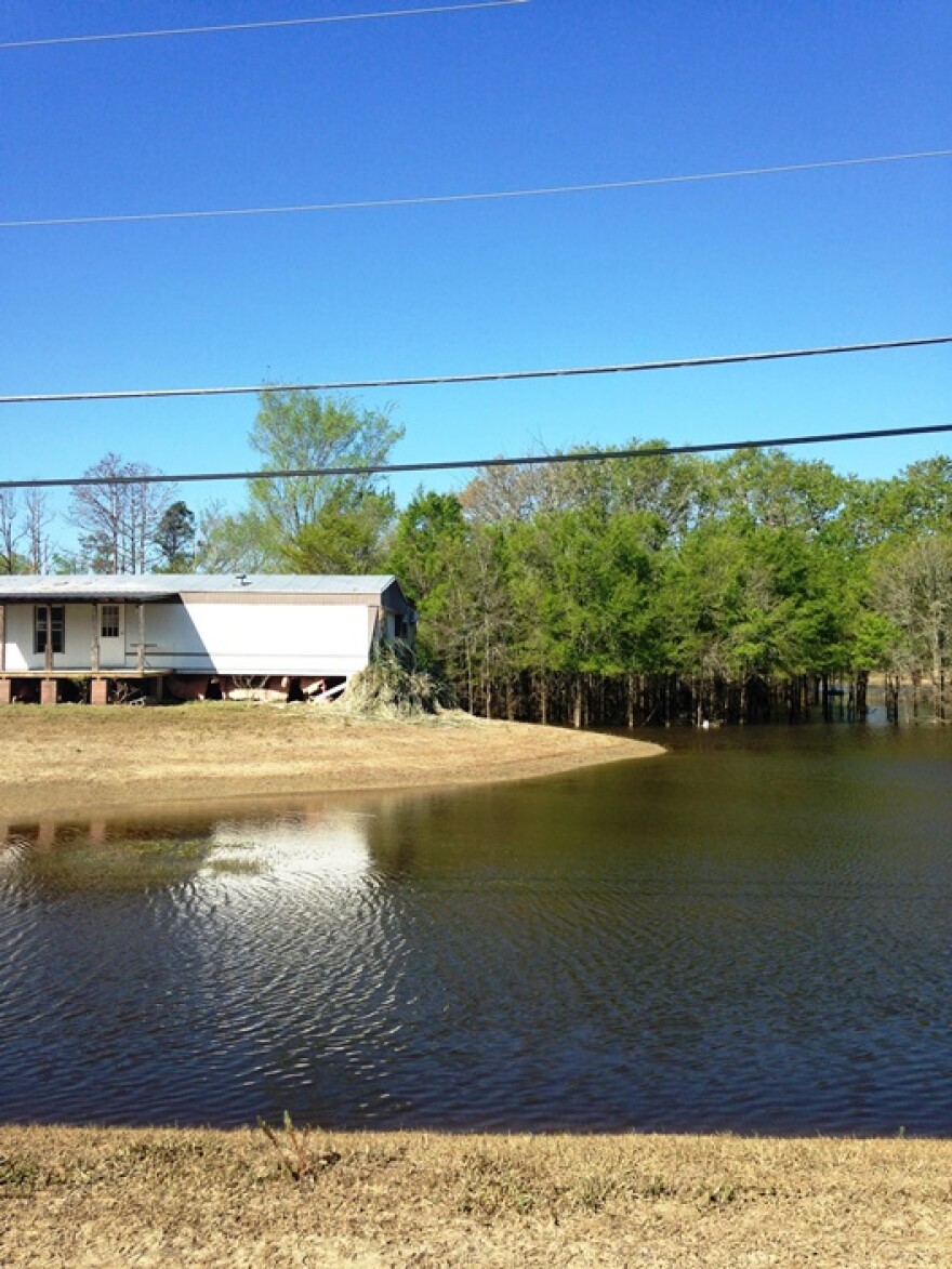 Water had receded Tuesday on Riding Club Lane in south Shreveport.