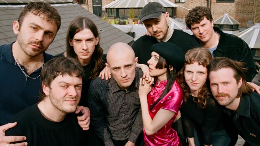 Caroline Polachek (center) with the band caroline (everybody else).