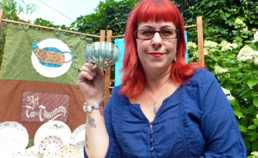 Tasseomancer Amy Taylor hosts readings at festivals, parties and other events out of her little "traveling tea room" in Hamilton, Ontario.