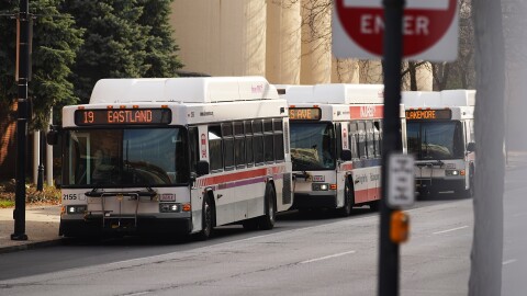  A row of Akron Metro RTA buses are lined up on South Broadway Street in Downtown Akron.
