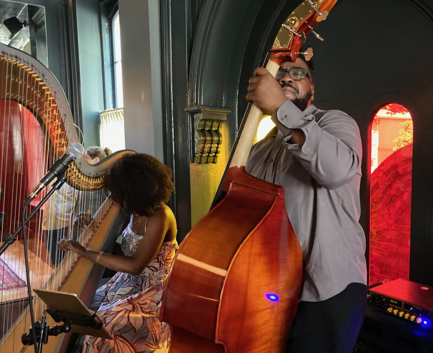  Brandee Younger and Dezron Douglas perform at the Hotel Saint Vincent in New Orleans on May 1, 2022.