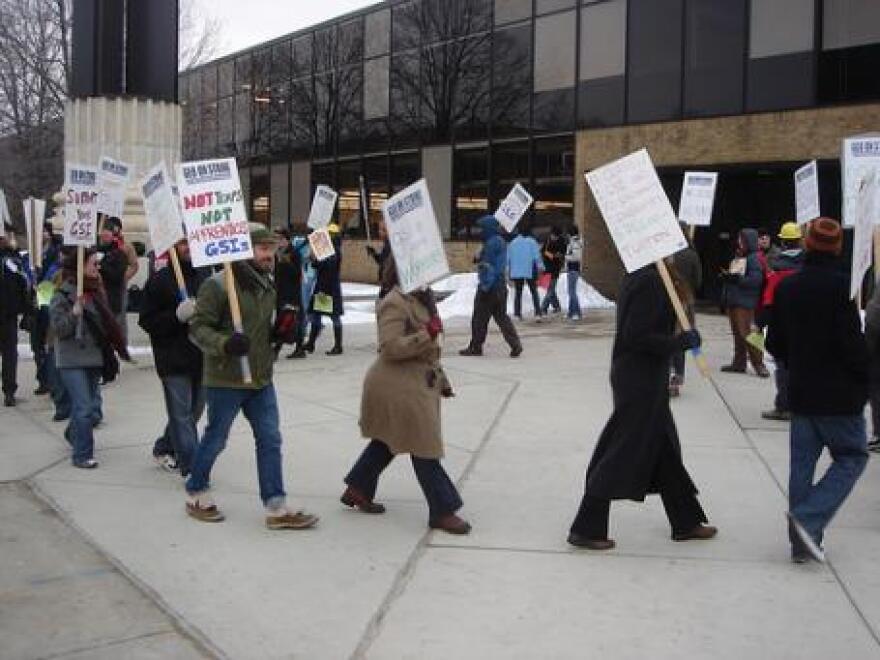 Members of the Graduate Employees Organization picketing on the North Campus of the University of Michigan in 2008. Many University administrators and deans maintain these research assistants are not "employees."