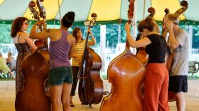 Students take a workshop in upright bass at a previous Culture Camp.