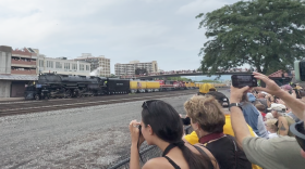 People waved as the Big Boy came through the rail tracks outside of the Railroaders Memorial Museum in Altoona on Wednesday, July 8. Many people stood on the  pedestrian bridges over the train tracks and nearby building rooftops. 