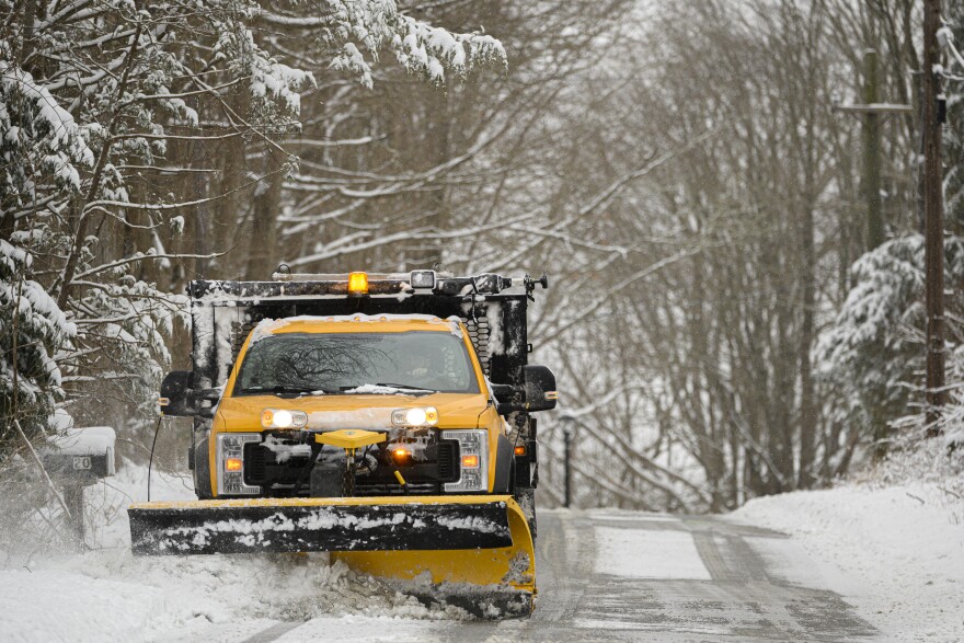 February 28, 2023 - Storrs Mansfield, Ct. - A Town of Mansfield plow clears a neighborhood road Monday morning after 4-8 inches of snow fell across Connecticut Monday night into Tuesday morning in the first major snowfall of the season. (Mark Mirko/Connecticut Public)