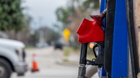 A gas pump is seen in a station on Feb. 1 in Houston. Gasoline prices hit a new national record, not adjusted for inflation, surpassing the previous peak set around two months ago.