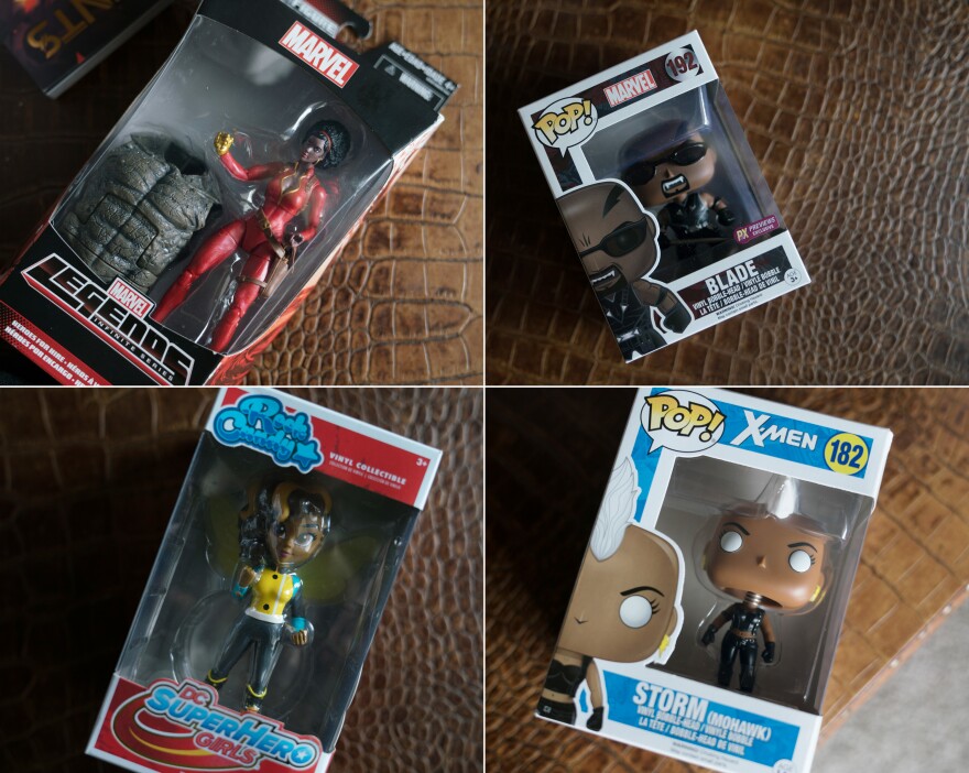 Characters that Williams has collected. At top left is Misty Knight, Williams' favorite superhero.