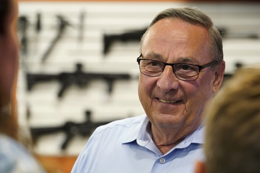 Paul LePage, Republican candidate for governor, campaigns at gun shop, Wednesday, Aug. 31, 2022, in Gray, Maine.