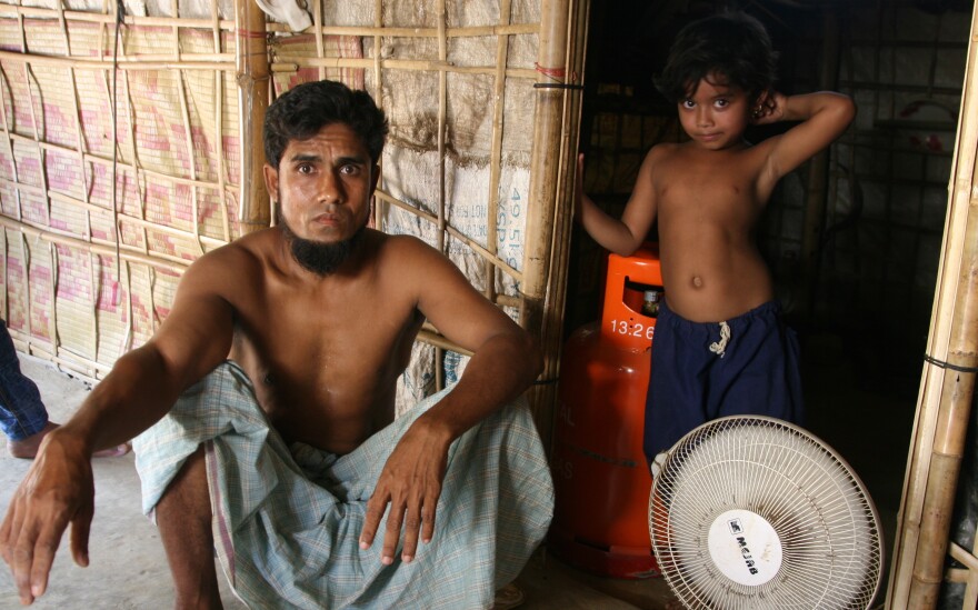 Hamid Hassin, sitting in his shelter in the Balukali refugee camp, says he has no desire to move to a new island camp being built for the Rohingya refugees.