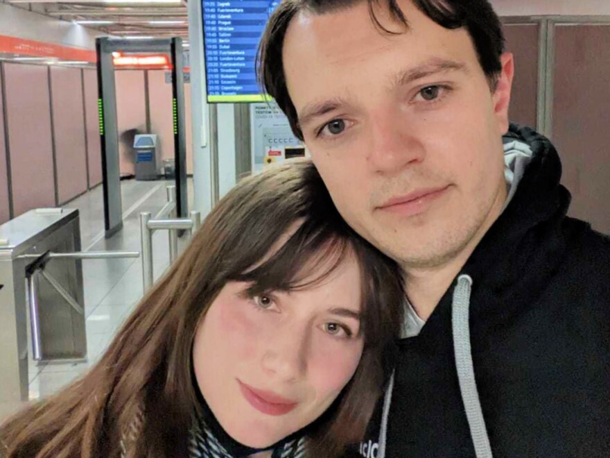 American Meghan Neville and her boyfriend, Maksym Lushpenko, left Ukraine for Warsaw on Monday. They decided to leave after warnings from the U.S. government that commercial flights might soon stop flying to and from the country amid rising tension with Russia.