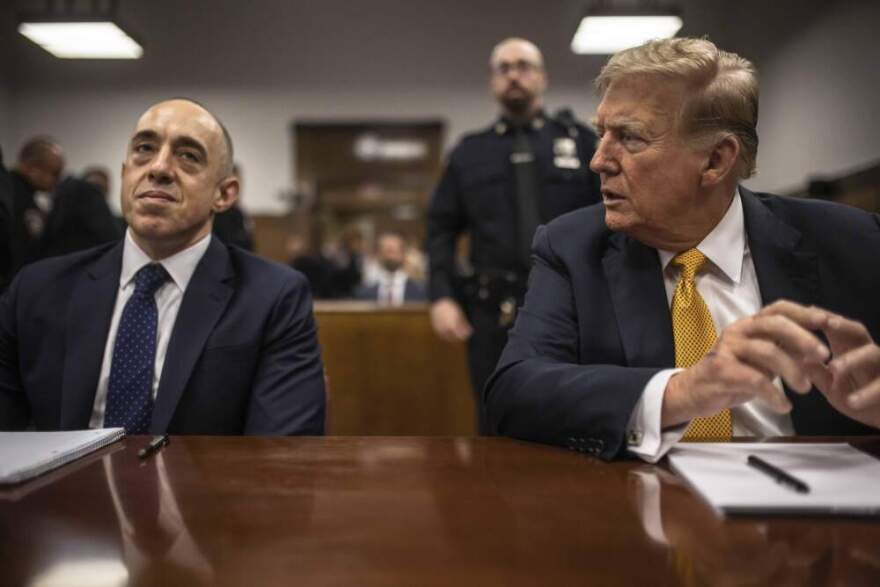 President Donald Trump sits in a courtroom next to his lawyer Emil Bove, left, before the start of the day's proceedings in the Manhattan Criminal court, Tuesday, May 21, 2024, in New York. (Dave Sanders/The New York Times via AP)