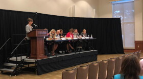 Seven members of the 14-person commission and advisory comittee on teacher pay.