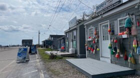 The entrance to Rye Harbor off Ocean Boulevard in Rye with buildings housing merchants, seafood and charter operations on Aug. 4, 2024. Dan Tuohy photo / NHPR