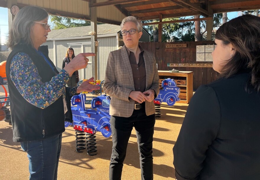 Gov.-elect Tina Kotek, reacts as Suey Linzmeier, executive director of Head Start of Yamhill County, tells her that preschoolers didn’t know how to use playground equipment.