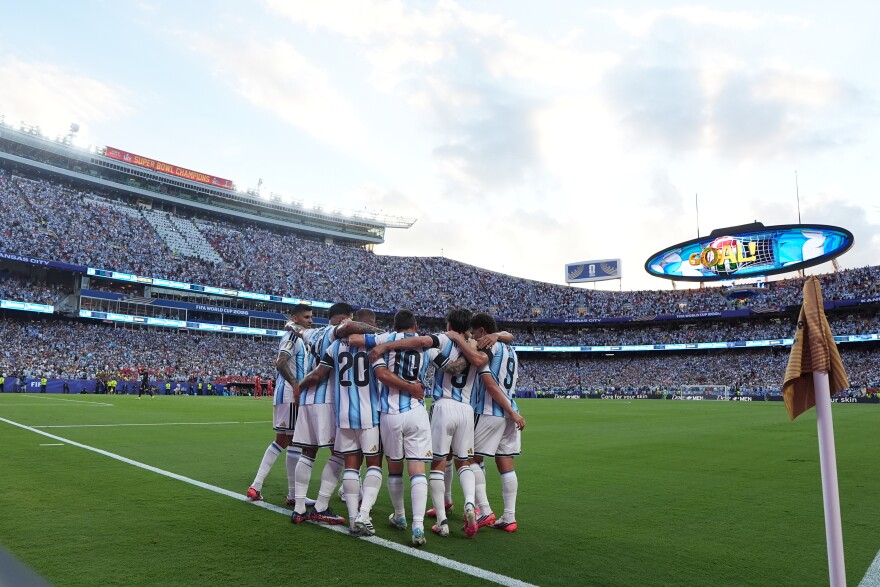 Argentina's Alexis Mac Allister is congratulated after scoring his side's opening goal during the World Cup quarterfinal soccer match between Argentina and Switzerland in Kansas City, Missouri, Saturday, July 11, 2026.