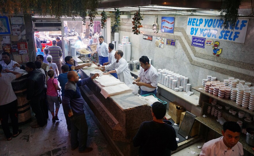 The assembly line set-up at Koshary Abou Tarek helps staff to keep up with the flood of orders at lunchtime.