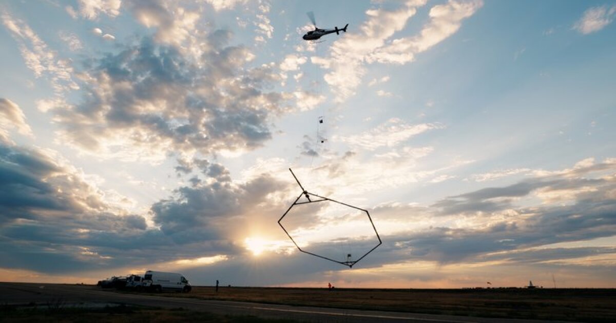 A helicopter towing a large hoop will begin mapping aquifers around Southwest Michigan this month