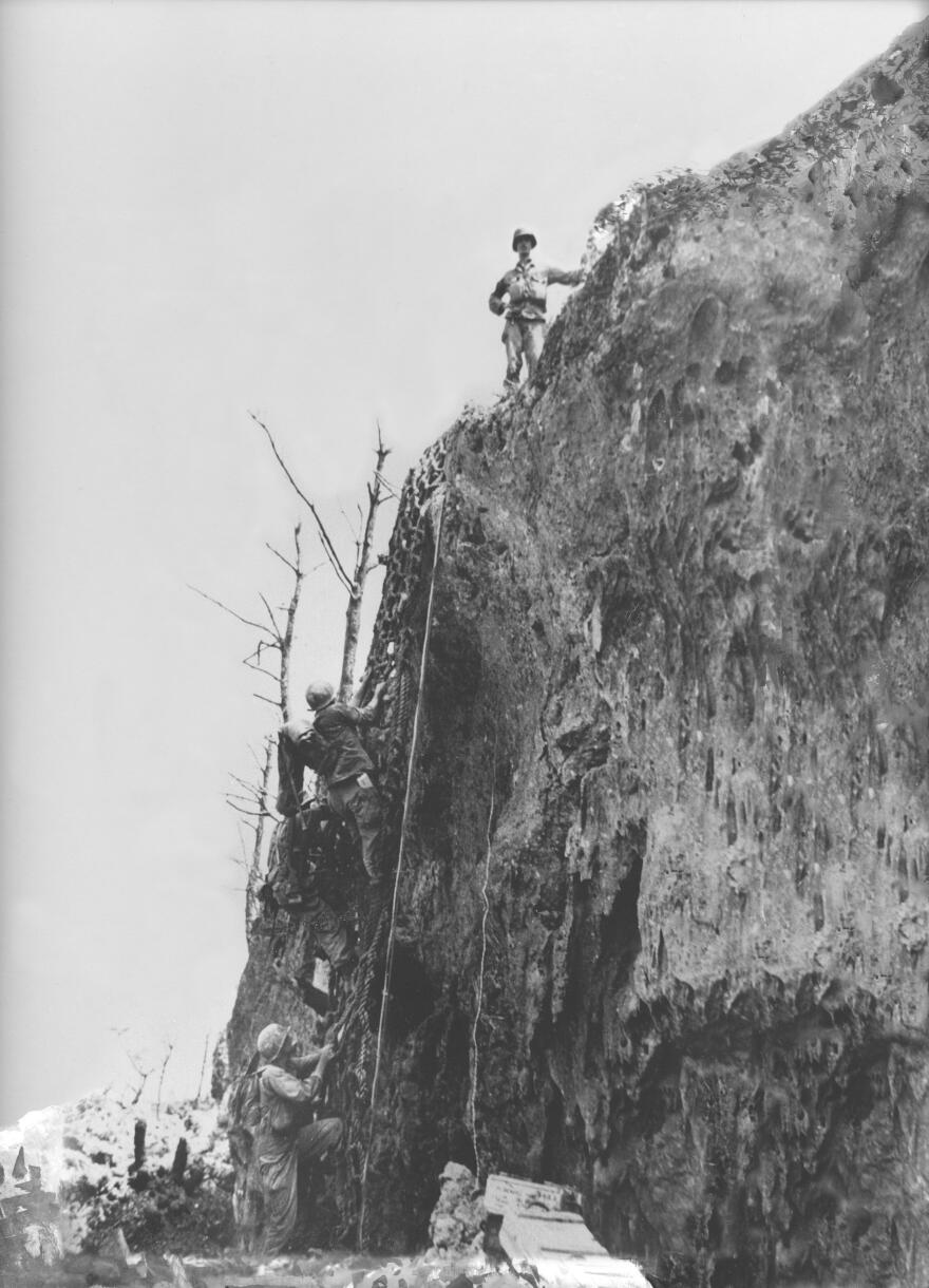 During the battle, Doss (seen here at the top of Hacksaw Ridge) dragged severely injured men to the edge of the ridge and lowered them down to other medics below.