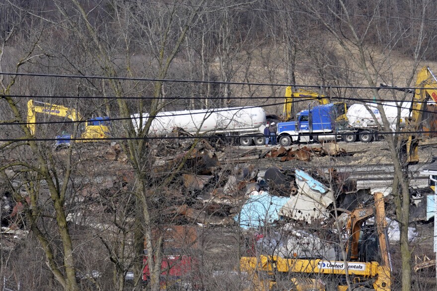 Workers continue to clean up remaining tank cars, Tuesday, Feb. 21, 2023, in East Palestine, Ohio, following the Feb. 3 Norfolk Southern freight train derailment.