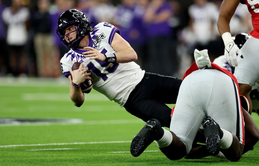 TCU quarterback Max Duggan is sacked in the second quarter during the College Football Playoff National Championship game on January 09, 2023.