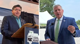 Gov. JB Pritzker, left, and Republican Darren Bailey speak at a candidate forum on agriculture issues at a farm near Bloomington on Monday, Aug. 10, 2026.