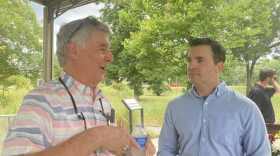 Pollocksville Mayor Jay Bender, left, talks with North Carolina Attorney General Jeff Jackson about the rescinding of $1.1 million in FEMA funding that would have helped the small Jones County town that was devastated by Hurricane Florence elevate business buildings to prevent future flooding