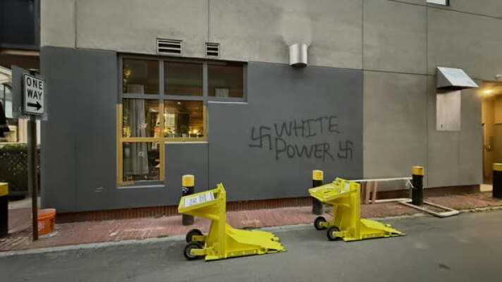 Vandals spray-painted white supremacist graffiti outside the Moka Pot coffee shop in Manchester early Wednesday.