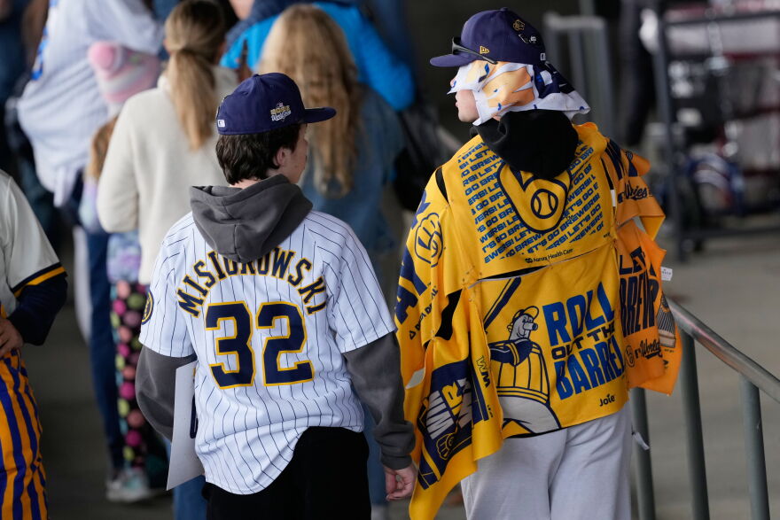 Milwaukee Brewers fans arrive for a rally during the baseball team's World Series parade, Friday, Oct. 30, 2026, in Milwaukee. (AP Photo/Nam Huh)