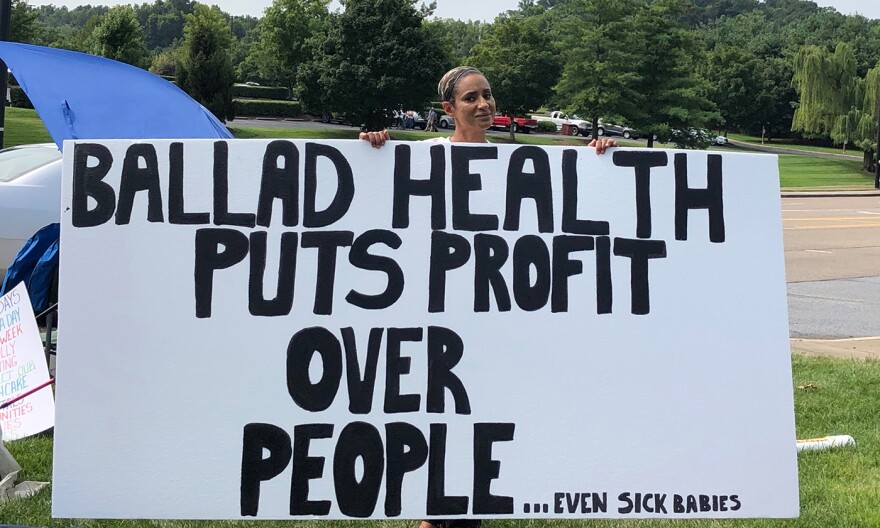 Dani Cook of Kingsport, Tennessee, protests the closure of a neonatal intensive care unit at her local hospital by Ballad Health, a regional nonprofit hospital company.