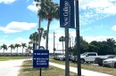 Signs at the Sarasota airport show straight ahead arrows for the airport and right for New College of Florida Pei campus.