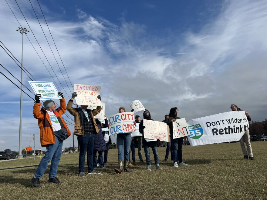 A small group of protestors with the grassroots group Rethink35 rallied near the tent where officials held a groundbreaking ceremony on Tuesday.