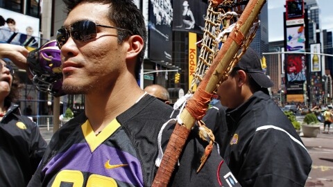 Brett Bucktooth, a member of the Iroquois Nationals Lacrosse team and Syracuse University's 2004 national championship team, visit Times Square, New York, Monday, July 12, 2010. The 23 players on the Iroquois Indian lacrosse team cannot fly to England for what's considered the Olympics of the sport because the U.S. government won't allow them to re-enter the country on Iroquois nation passports. "This is a world championship. I am hoping there is a resolution to this problem quickly," said Bucktooth. (AP Photo/Bebeto Matthews)