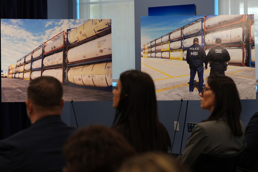 Photos taken by Homeland Security Investigations are displayed at a news conference where federal agencies announced the seizure of biodiesel fuel shipments that were being illegally exported from the U.S. to Cuba, Wednesday, Oct. 7, 2026, in Doral, Fla.