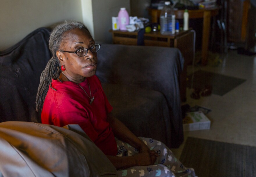 DeAnna Malone, 68, poses in her apartment. Williams has his own place outside of Dosker Manor but she often stays with Malone.