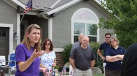  Amanda Adkins speaks with voters in Spring Hill and Lenexa on August 1.