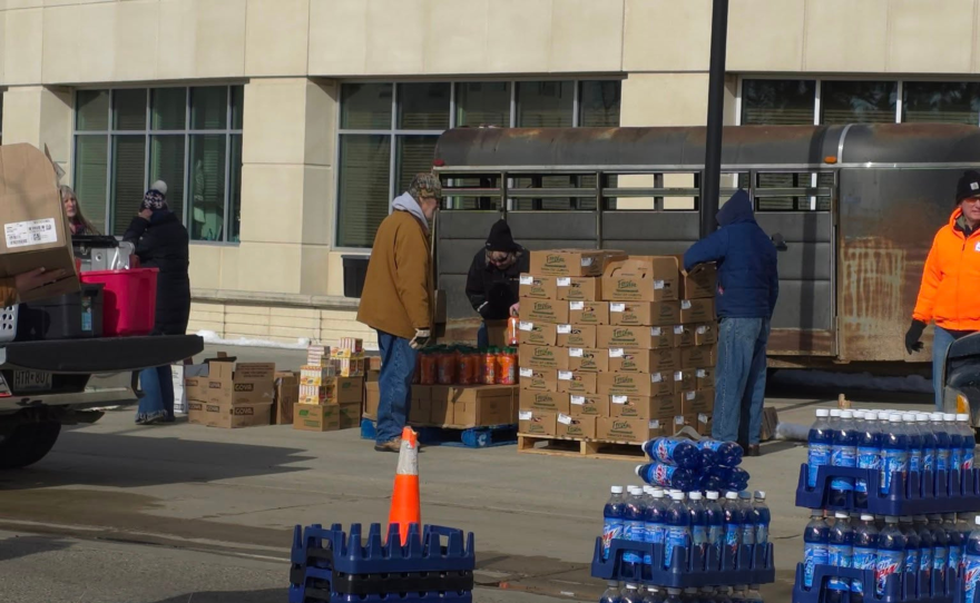 Volunteers work to distribute items during a Ruby's Pantry event at the Bemidji Sanford Center on March 18, 2026.