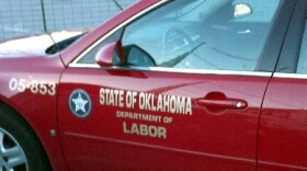 Department of Labor vehicle on fairgrounds.