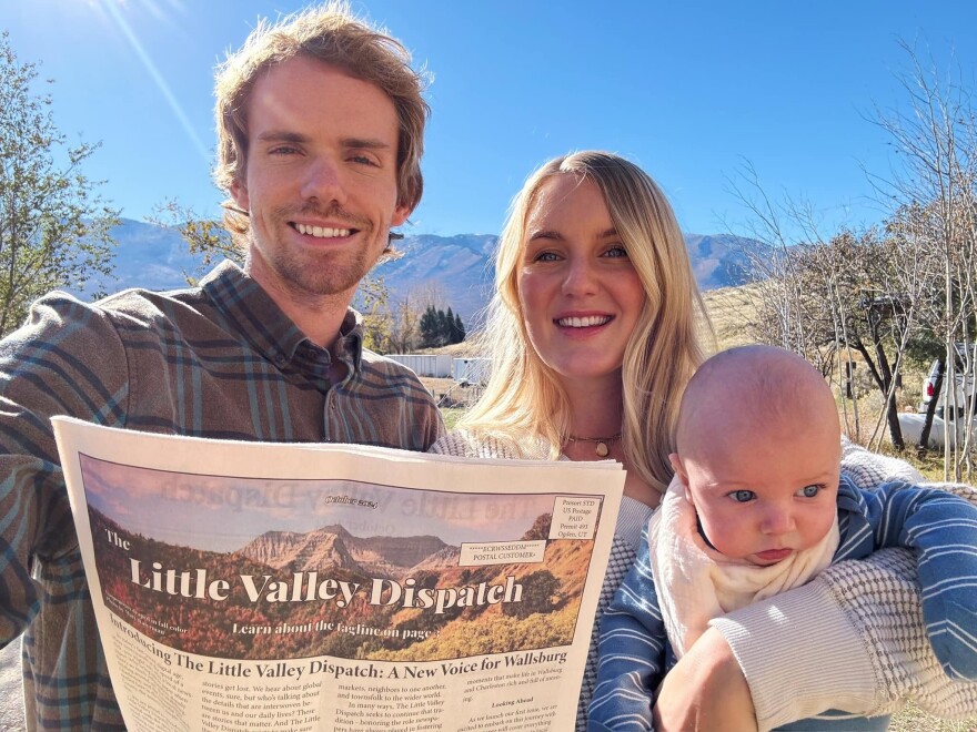 Photo of Elliot and Rebekah Anderson of "The Little Valley Dispatch" with Weston Anderson