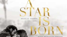 Bradley Cooper and Lady Gaga rest their foreheads on each other.