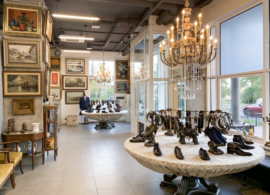 The Zlocci shop features collections of flashy men's shoes made from crocodile and caiman skins arranged on two polished marble tables. I<strong></strong>n 2015, investigative reporters<strong> </strong>traced the ownership of the business to Zlochevsky.