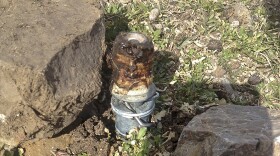 This March 16, 2017, file photo released by the Bannock County Sheriff's Office shows a cyanide device in Pocatello, Idaho. Citing public safety concerns, the Bureau of Land Management is ending the use of spring-loaded booby traps planted on public lands that eject cyanide powder when triggered to kill coyotes and other livestock predators, a practice wildlife advocates and others have been trying to outlaw for decades.