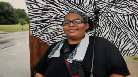 Milly Hobbs waiting for her first bus of the day on July 25. Milly is a fast food worker and new mother. She spends on average three hours on the bus to get to and from each shift. 