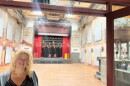Heather LaGarde poses in front of the stage of Haw River Ballroom. Photo courtesy of Heather LaGarde