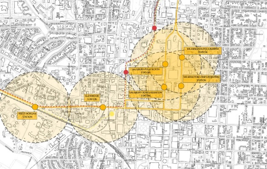 Raleigh's plan in dark yellow with proposed stations, two of TTA's options in dotted red and light yellow lines 