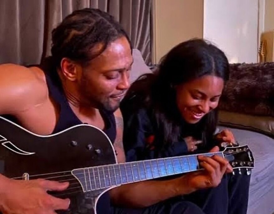 Imani Archer with her father, D'Angelo.